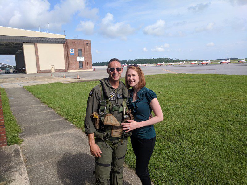 A man and woman standing next to each other.