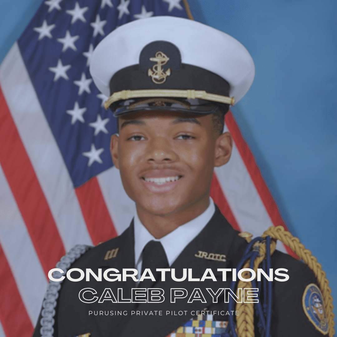 A picture of caleb payne in uniform with an american flag.