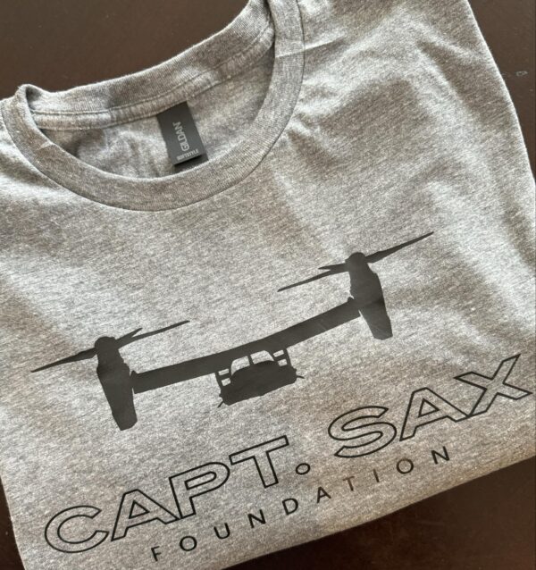 A t-shirt with an image of a helicopter on it.