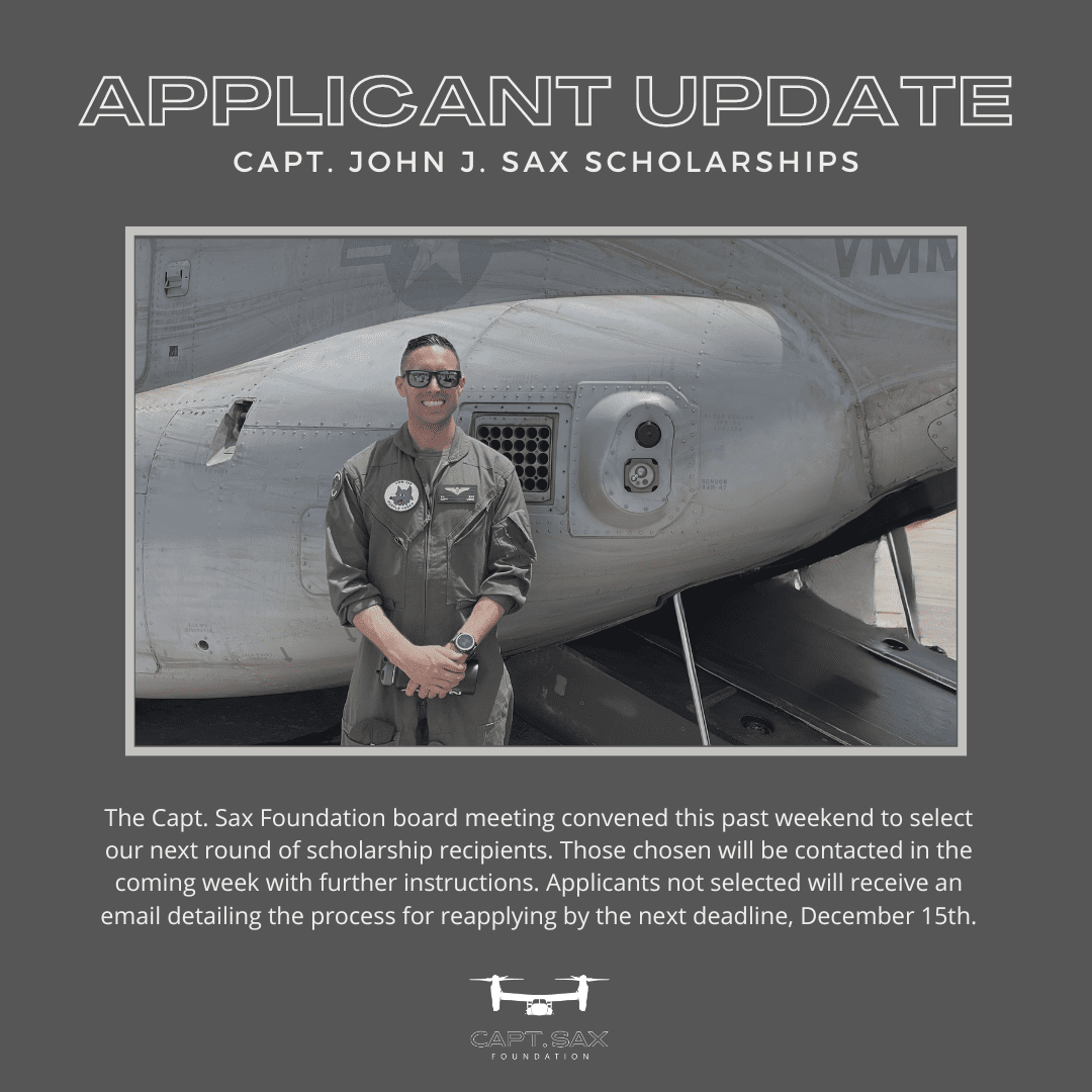 A man standing in front of an airplane.