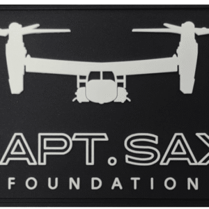 Embroidered patch image featuring the Sax Foundation logo and saxophone icon